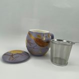 Melrose Teás bögre szűrővel 